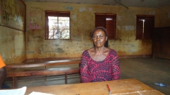 Margaret lives in Uganda and is a single mother of four. She sells and trades used clothes, working seven days a week. The W3LL PEOPLE Kiva Team is supporting her in her effort to build her small business. 